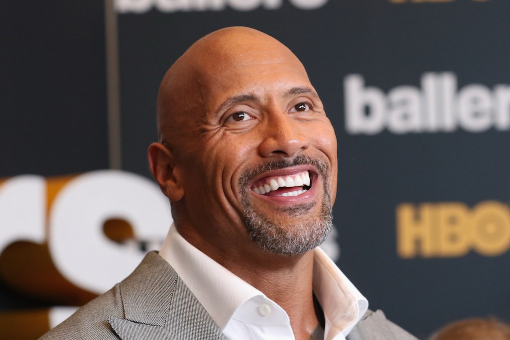 Dwayne Johnson smiles during a "Ballers" media event.