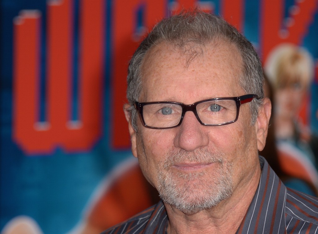 Ed O'Neil stands on the red carpet during a television show premiere.