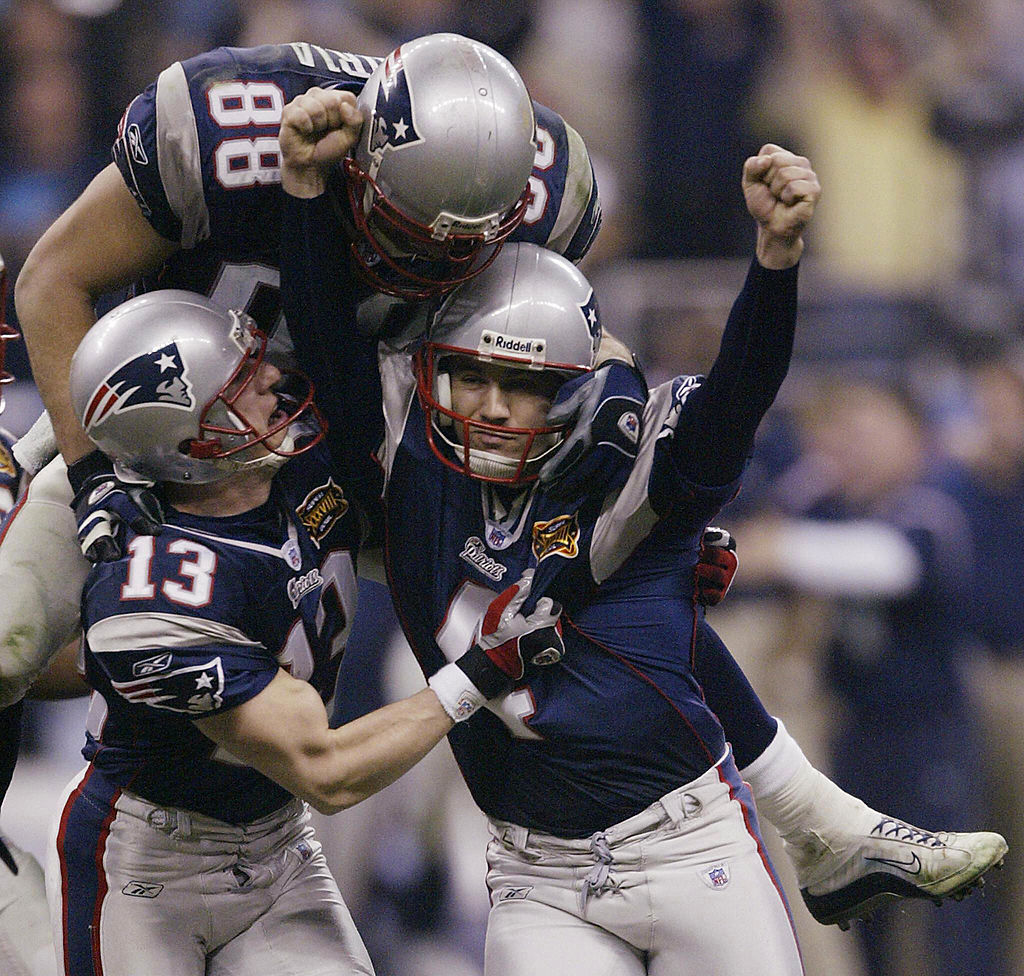 New England Patriots kicker Adam Vinatieri is congratulated after his game-winning, 41-yard field goal in the final seconds of Super Bowl XXXVIII against the Carolina Panthers.