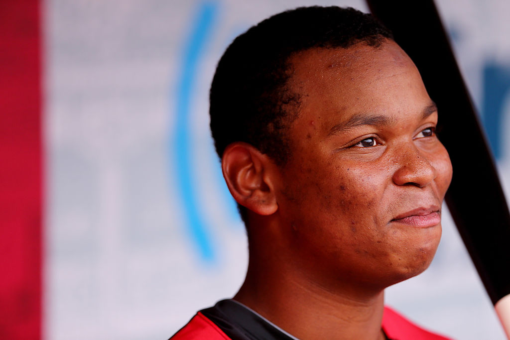 Rafael Devers of the World Team looks on during batting practice