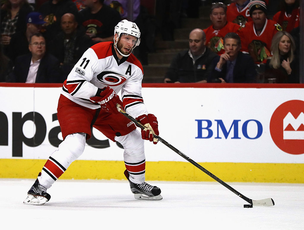Jordan Staal of the Carolina Hurricanes controls the puck against the Chicago Blackhawks.