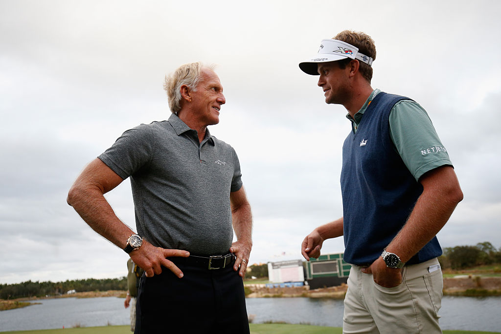 Greg Norman and Harris English chat on the 18th green following the final round of the Franklin Templeton Shootout at Tiburon Golf Club on December 10, 2016 in Naples, Florida. | Chris Trotman/Getty Images