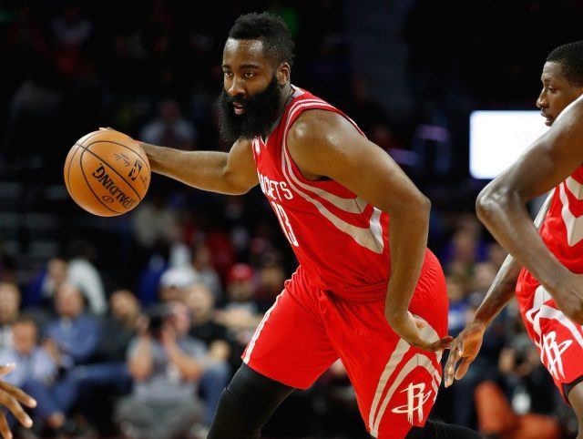 James Harden dribbles down the court.