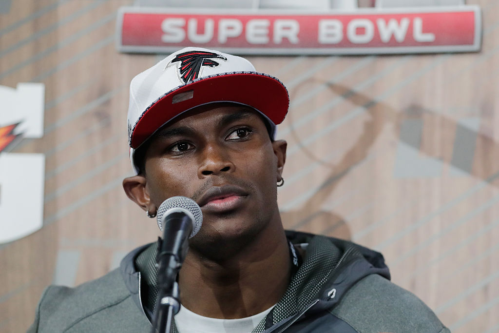 Julio Jones of the Atlanta Falcons listens to reporters during a pre-Super Bowl press conference.