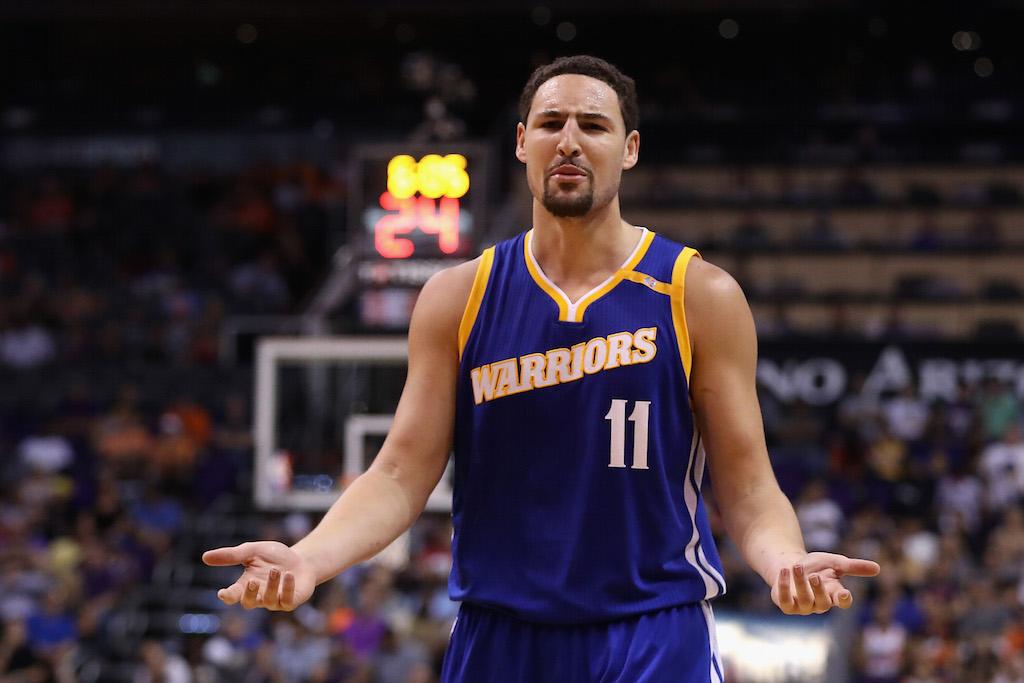 Klay Thompson argues a call made by the referee.