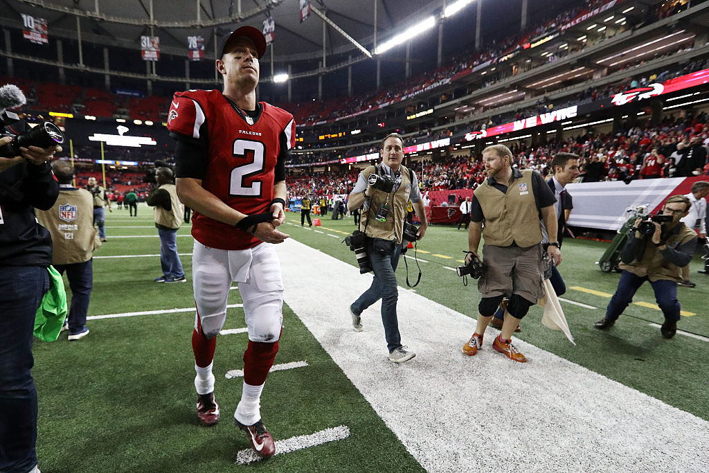 Matt Ryan of the Atlanta Falcons runs off the field.