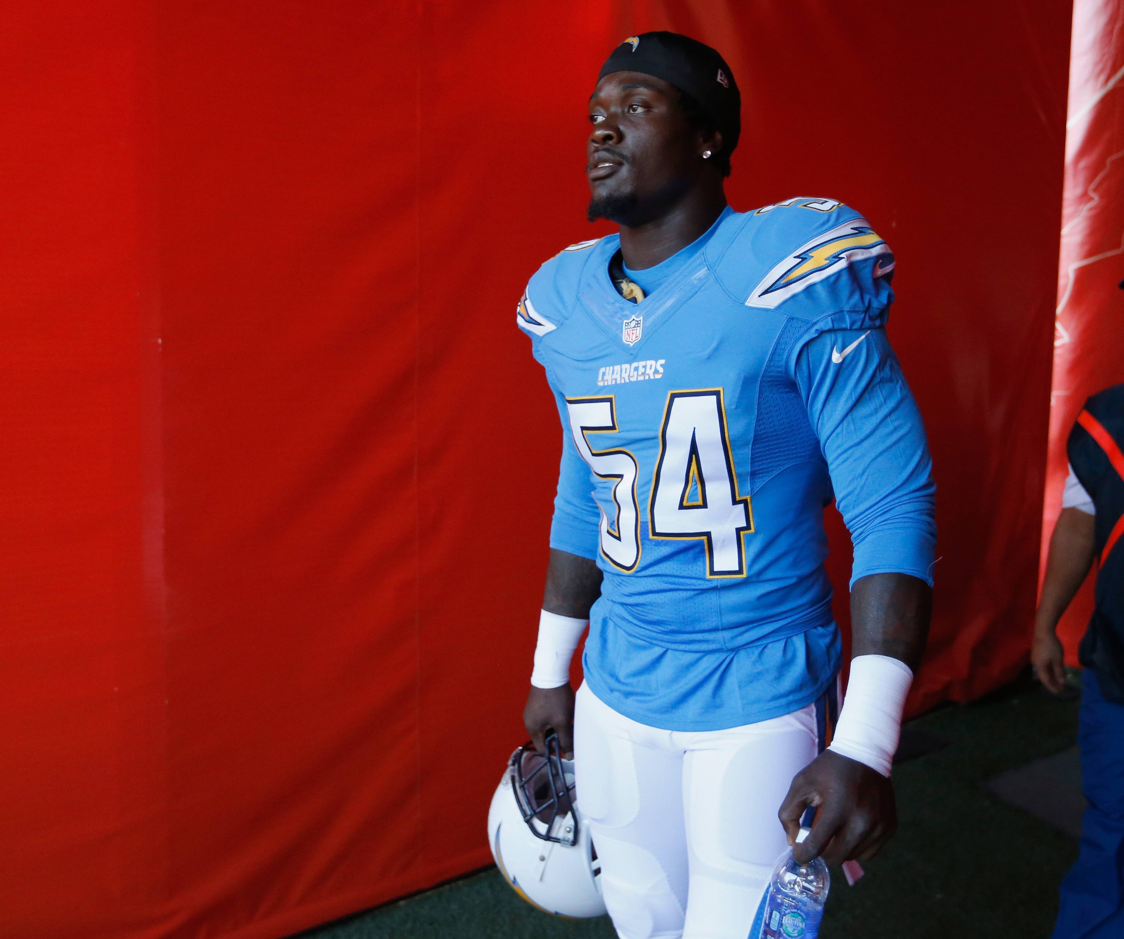 Melvin Ingram waits to take the field before a game in 2016. 