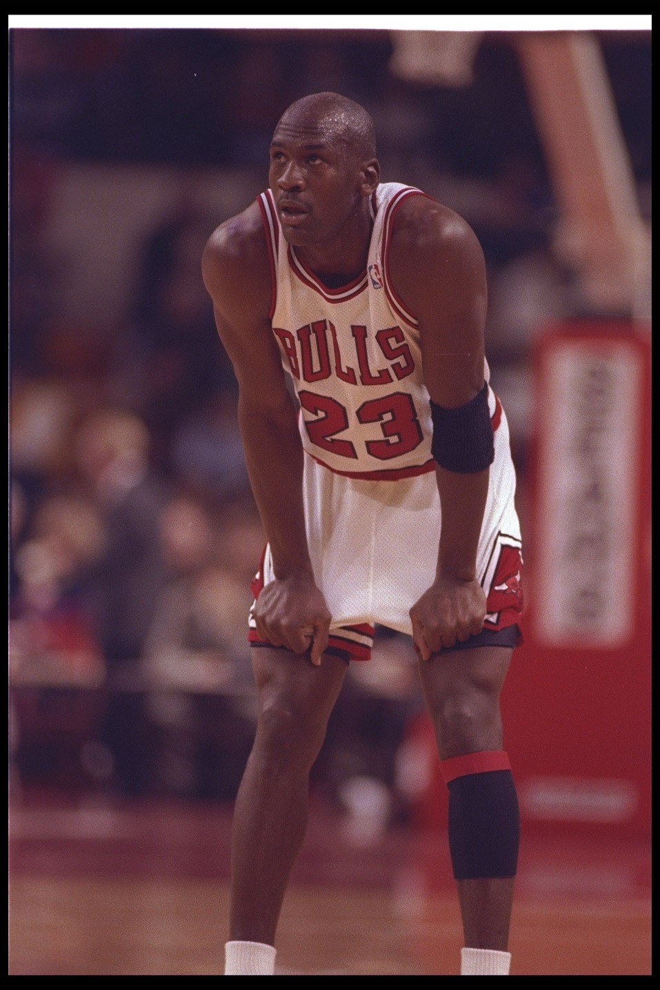 Guard Michael Jordan of the Chicago Bulls catches his breath during a game against the Denver Nuggets