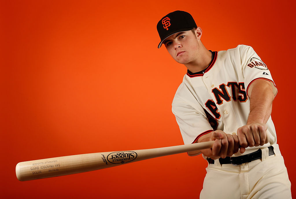 Christian Arroyo of the San Francisco Giants poses for a portrait during spring training photo day