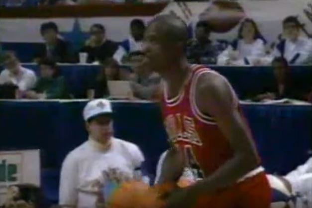 Craig Hodges going up for a three.
