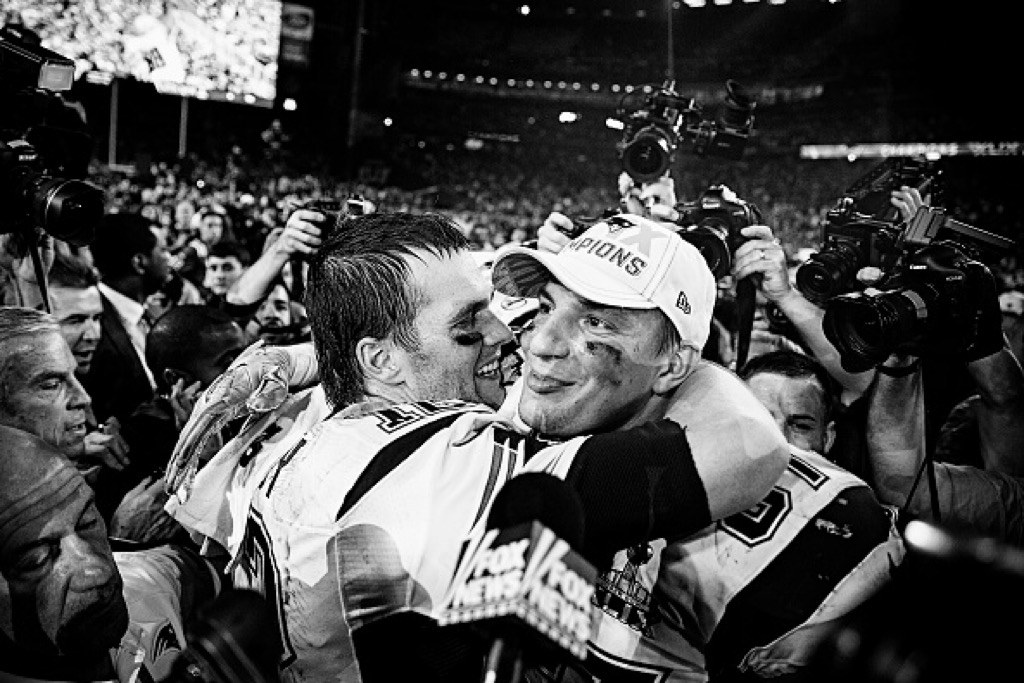 Quarterback Tom Brady congratulates his teammate Rob Gronkowski after winning Super Bowl XLIX.