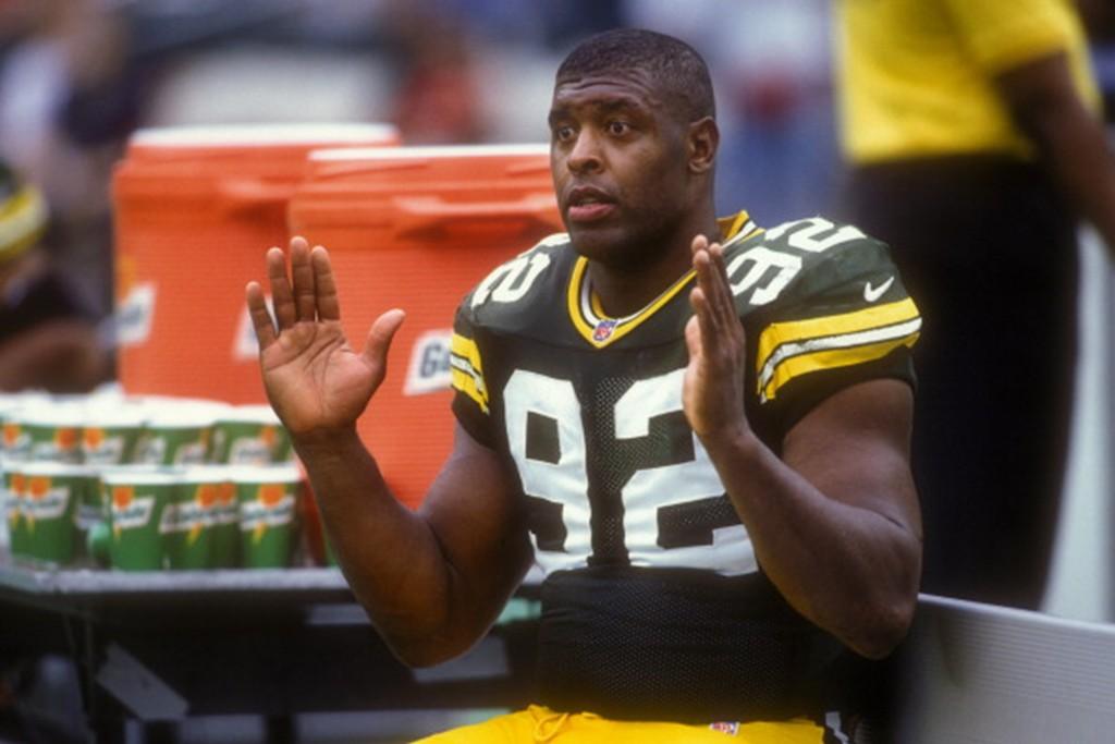 Reggie White of the Green Bay Packers looks on during a football game against the Philadelphia Eagles.
