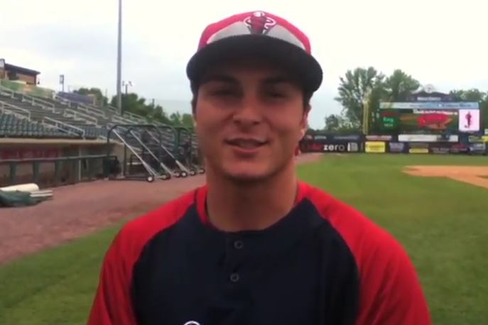One of the Boston Red Sox prospects, Nick Longhi, doing an interview from the field.