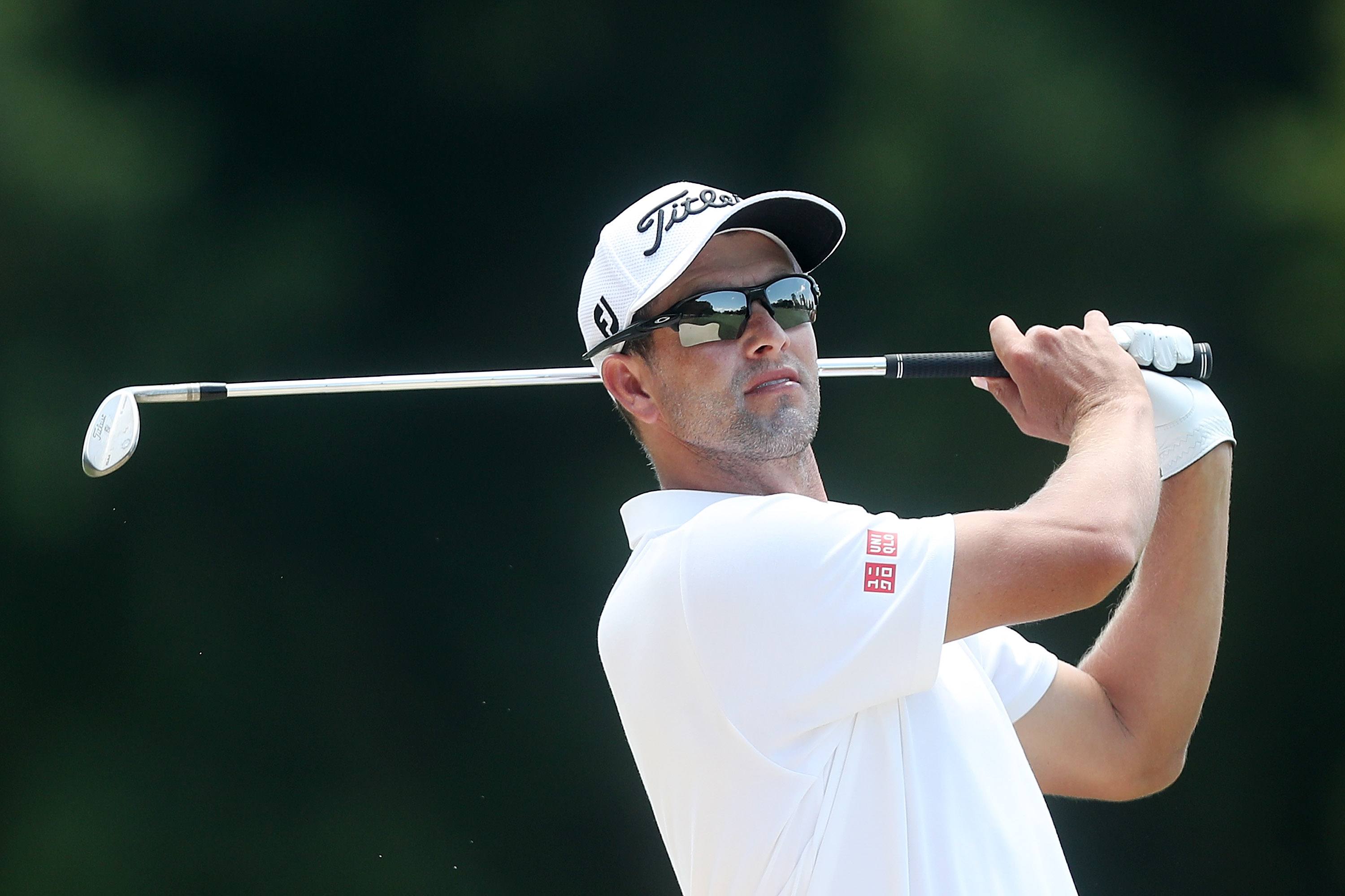Adam Scott swings.