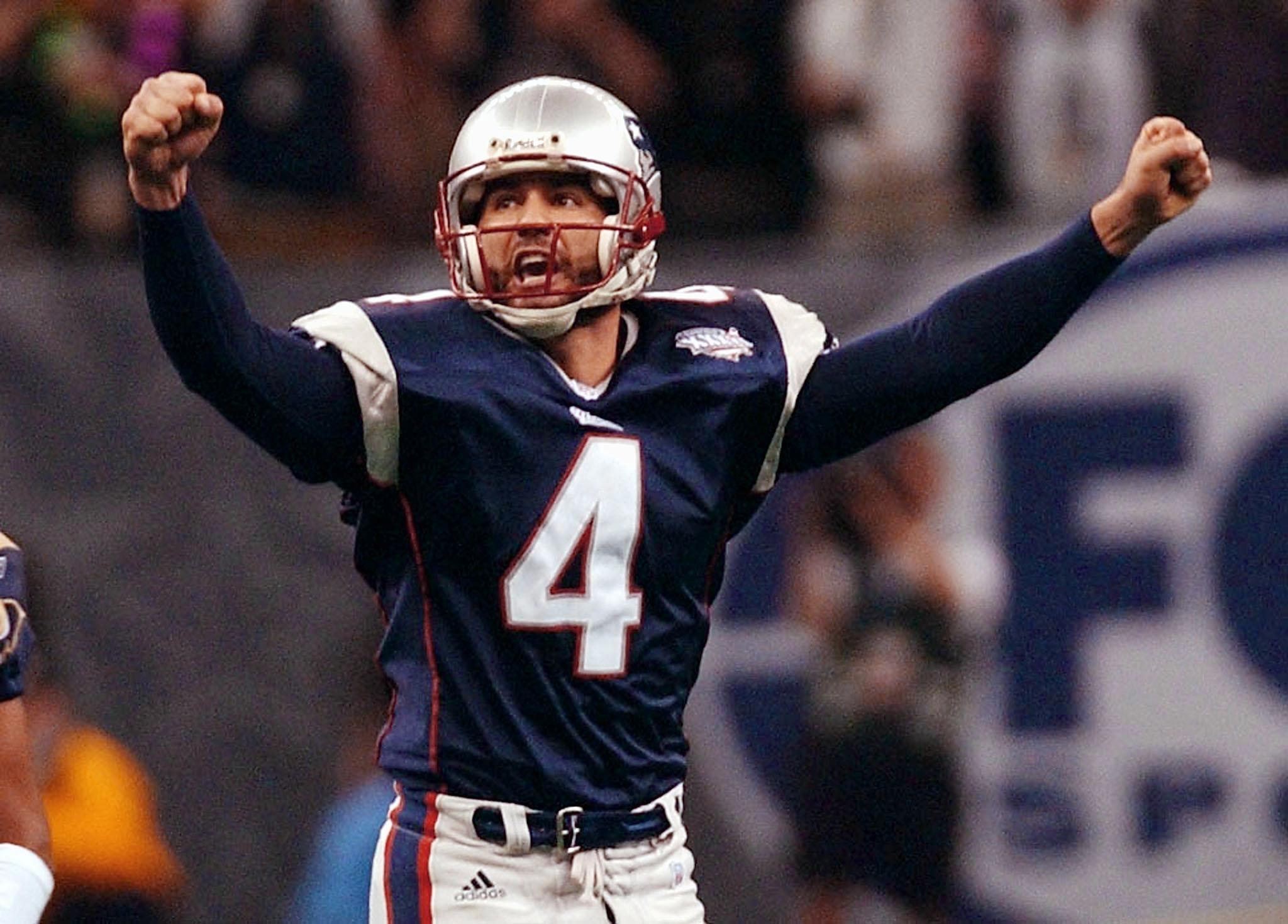 New England Patriots kicker Adam Vinatieri celebrates his game-winning field goal in the second half 03 February, 2002 of Super Bowl XXXVI in New Orleans, Louisiana. The Patriots defeated the St. Louis Rams 20-17 for the NFL championship.