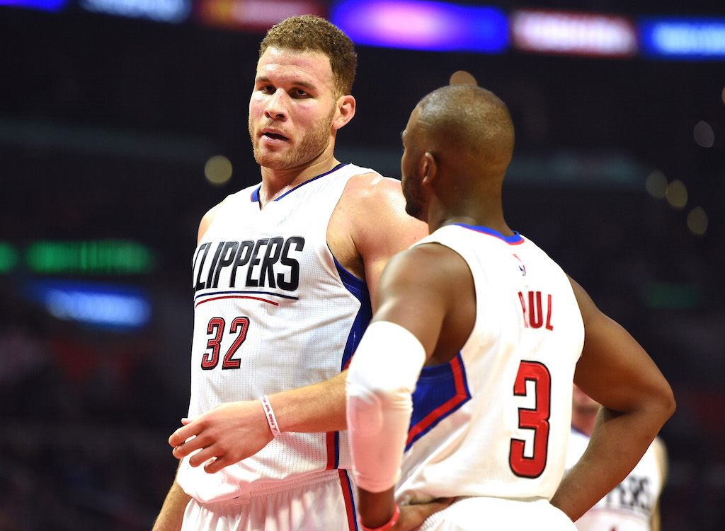 Blake Griffin talks to Chris paul between plays.