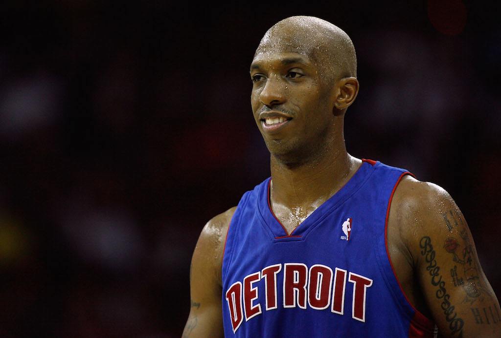 Chauncey Billups smiles before he shoots a free throw.