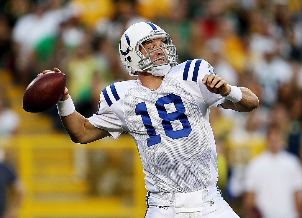 Peyton Manning of the Indianapolis Colts throws a pass against the Green Bay Packers 