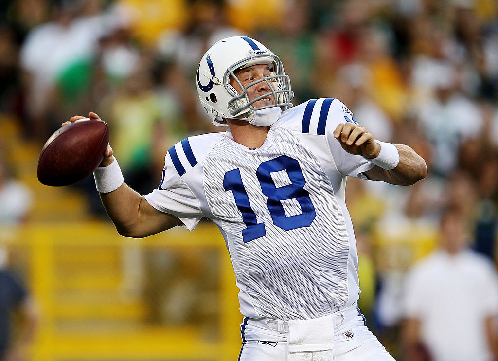 Peyton Manning of the Indianapolis Colts throws a pass against the Green Bay Packers 