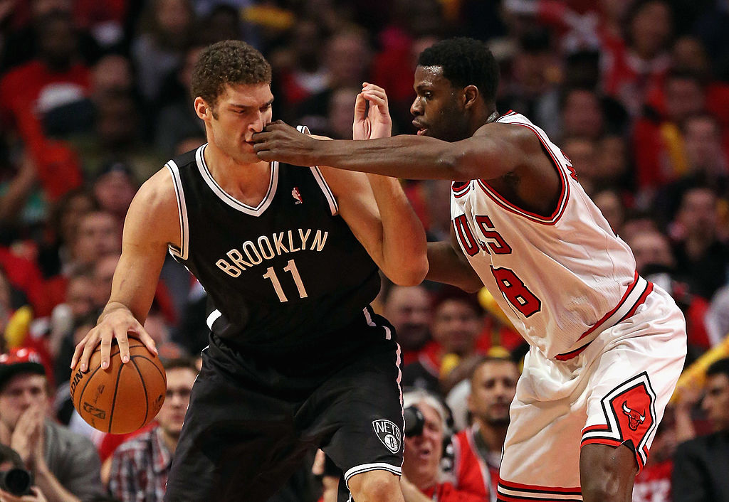 Nazr Mohammed of the Chicago Bulls hits Brook Lopez of the Brooklyn Nets in the face in Game 3 of the Eastern Conference Quarterfinals.