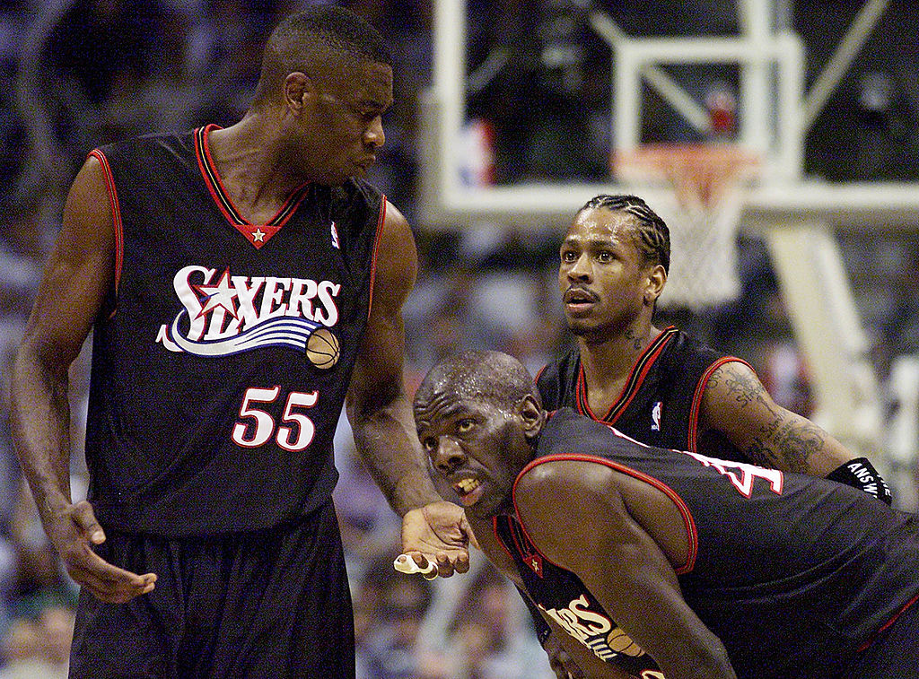 Dikembe Mutombo rests between plays.