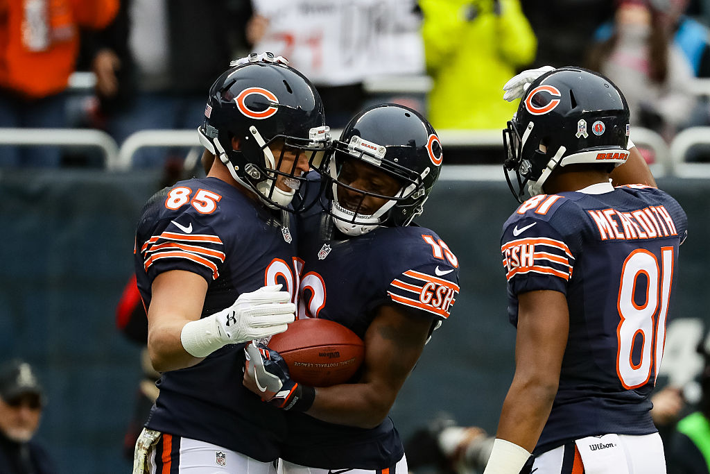 Daniel Brown of the Chicago Bears reacts with Eddie Royal after scoring.