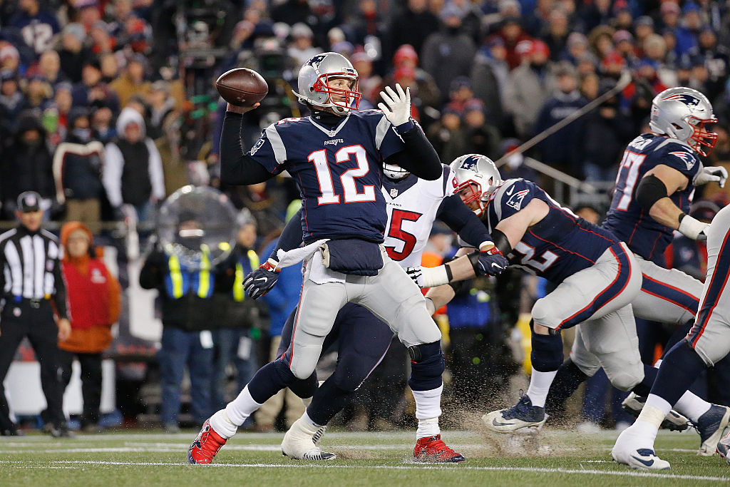 Tom Brady plays against the Houston Texans in a playoff game.