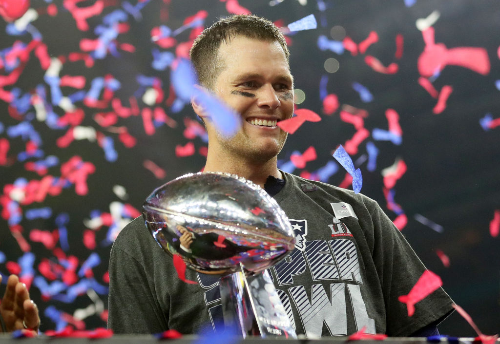 Tom Brady of the New England Patriots holds the Vince Lombardi Trophy after defeating the Atlanta Falcons in Super Bowl 51.