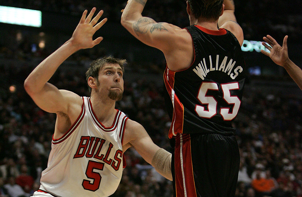 Andres Nocioni of the Chicago Bulls defends Jason Williams of the Miami Heat.