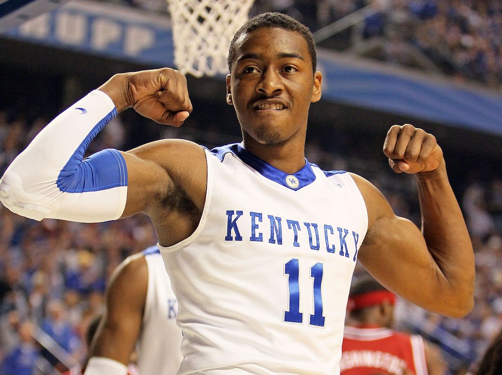 John Wall flexes after scoring as he represents Kentucky on the court.