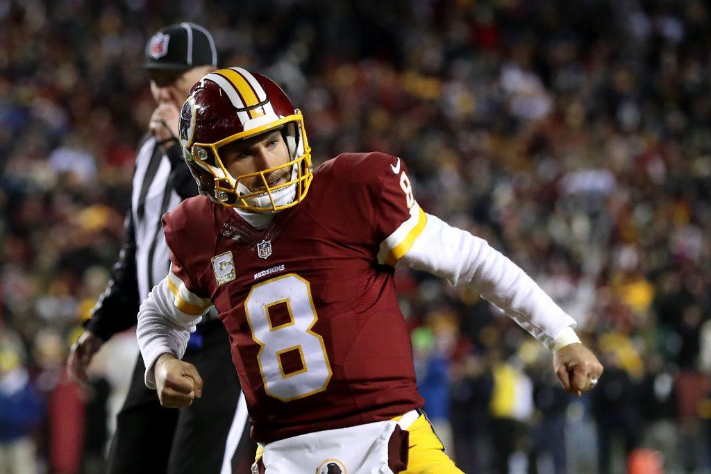 Kirk Cousins fist pumps.