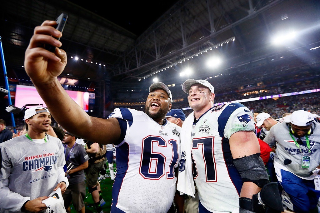 Marcus Cannon and Rob Gronkowski of the New England Patriots celebrate after winning Super Bowl XLIX.