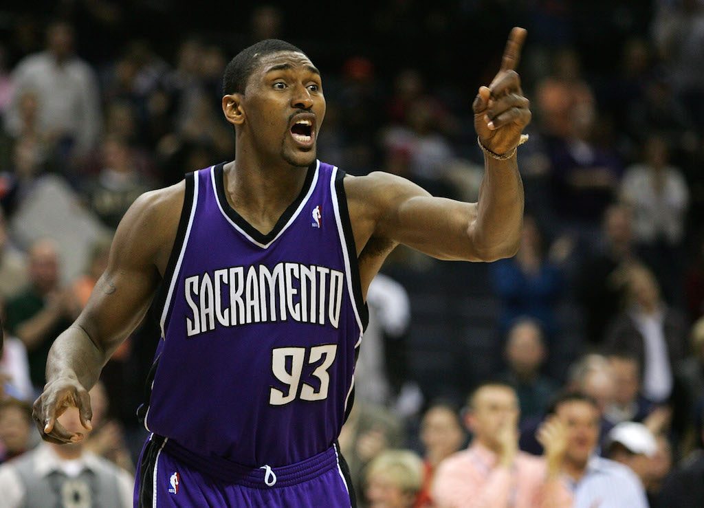 Metta World Peace angrily points his finger at the referee.