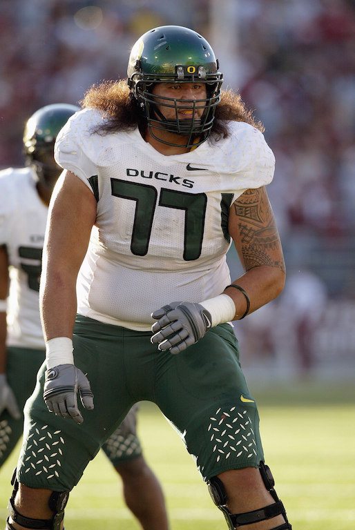 Offensive guard Palauni Ma Sun of the Oregon Ducks looks on against the Washington State Cougars in 2006.