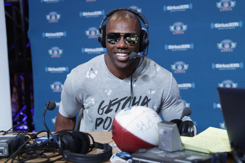 Terrell Owens speaks to the hosts during a radio show.