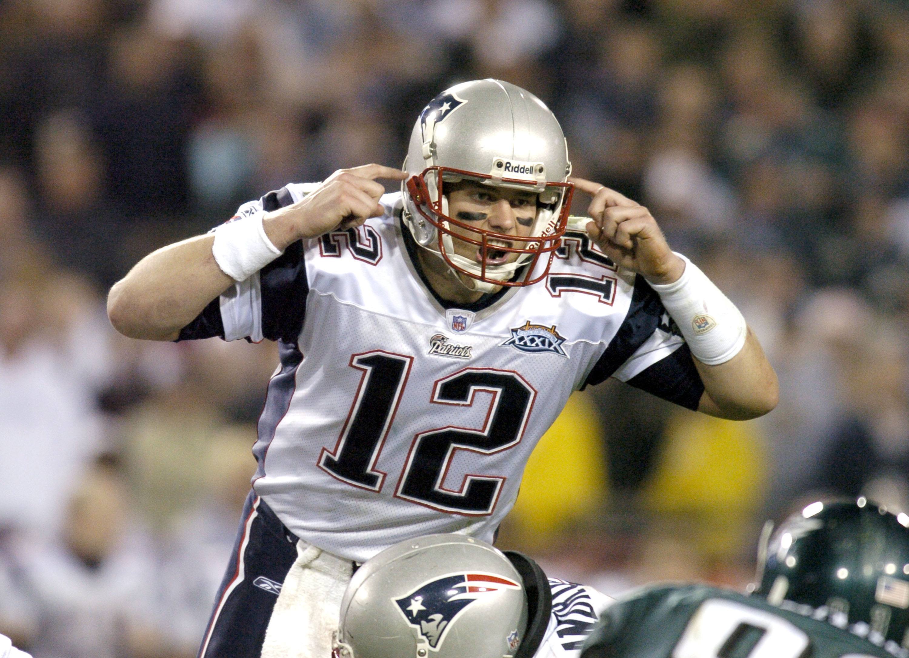 New England Patriots QB Tom Brady #12 makes a call during Super Bowl XXXIX. 