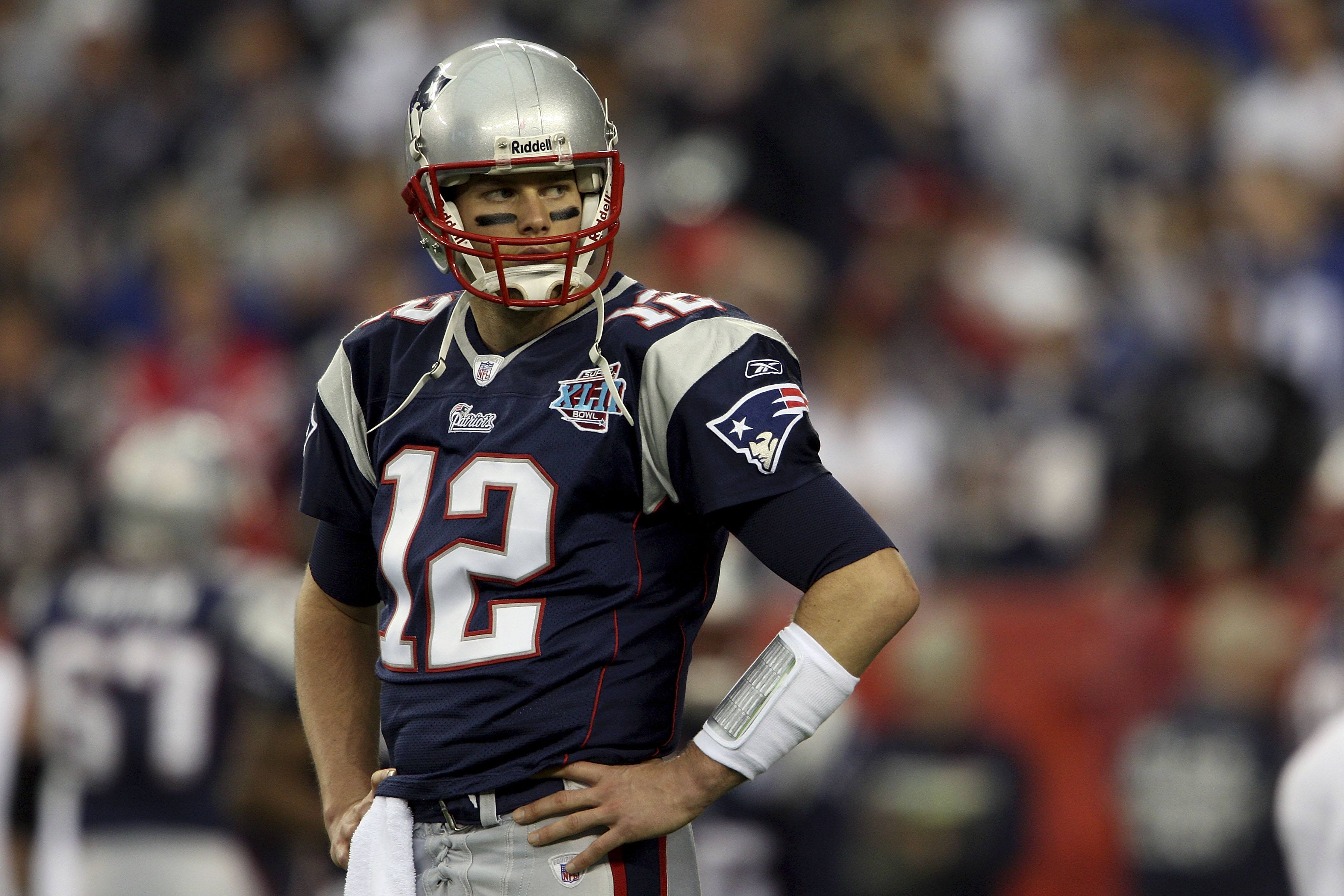 Quarterback Tom Brady #12 of the New England Patriots looks on during Super Bowl XLII.