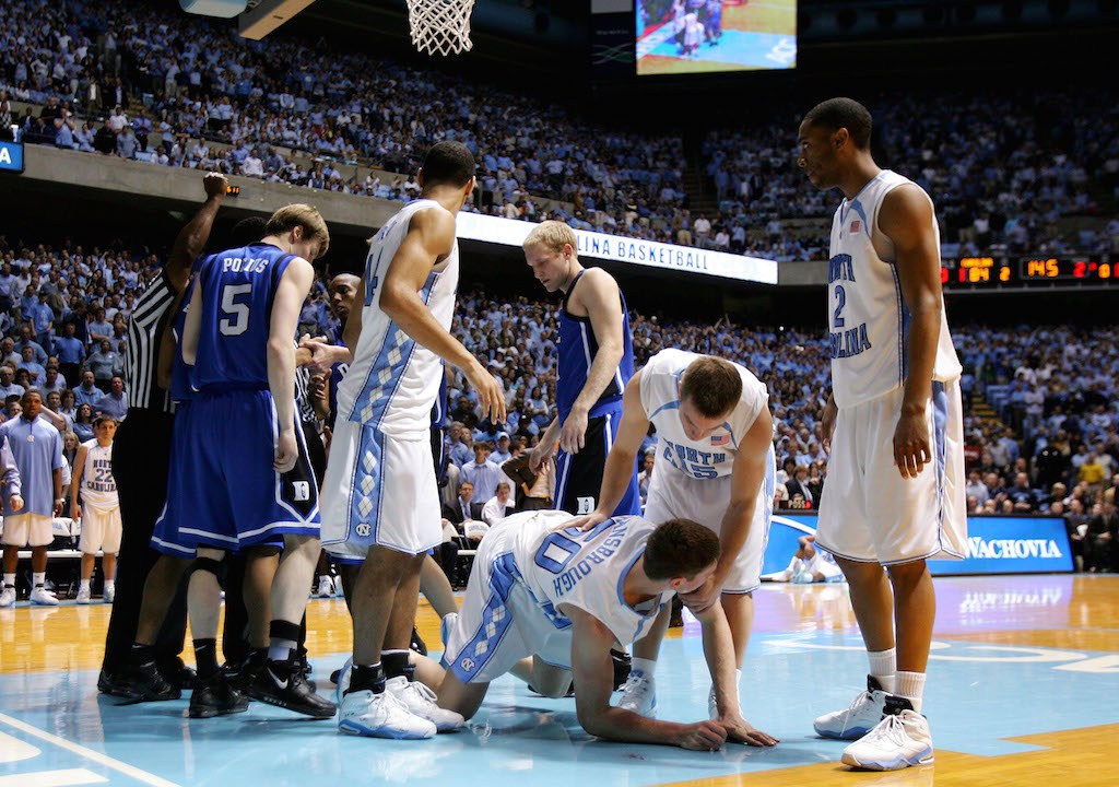 UNC's Tyler Hansbrough falls to the ground.