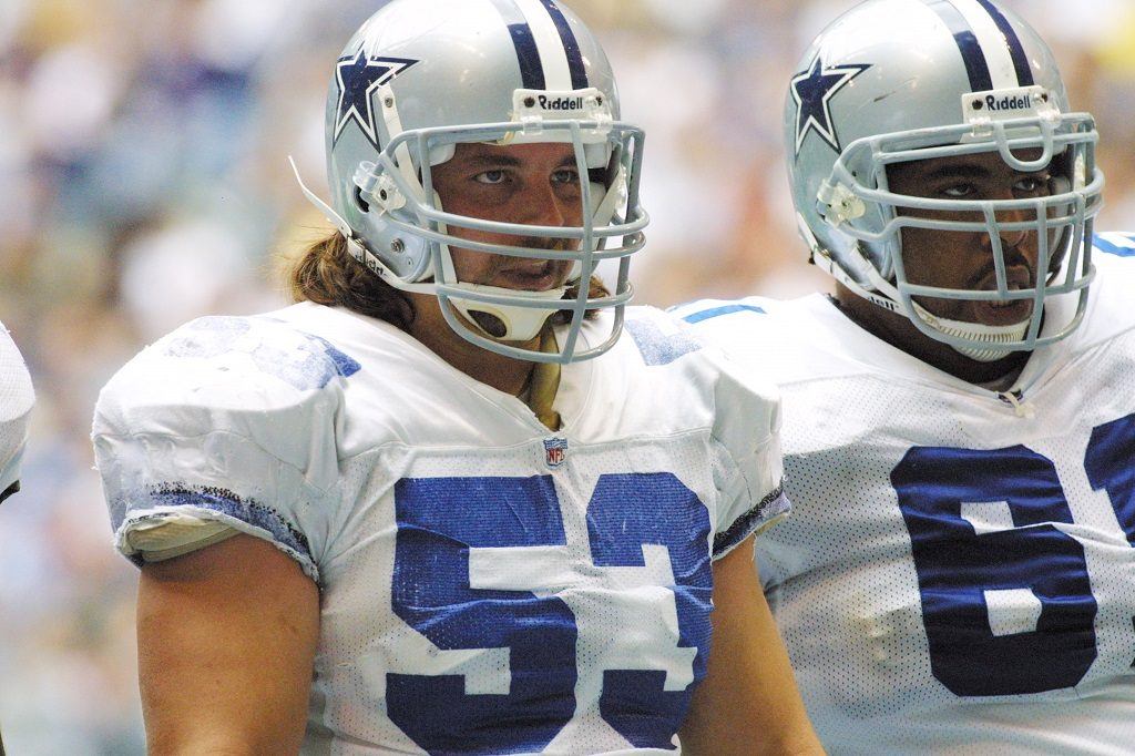 Mark Stepnoski stands on the Cowboys' sideline.