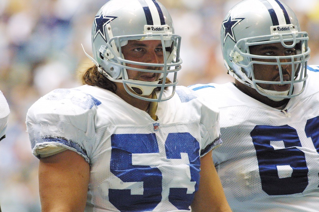 Mark Stepnoski stands on the Cowboys' sideline.