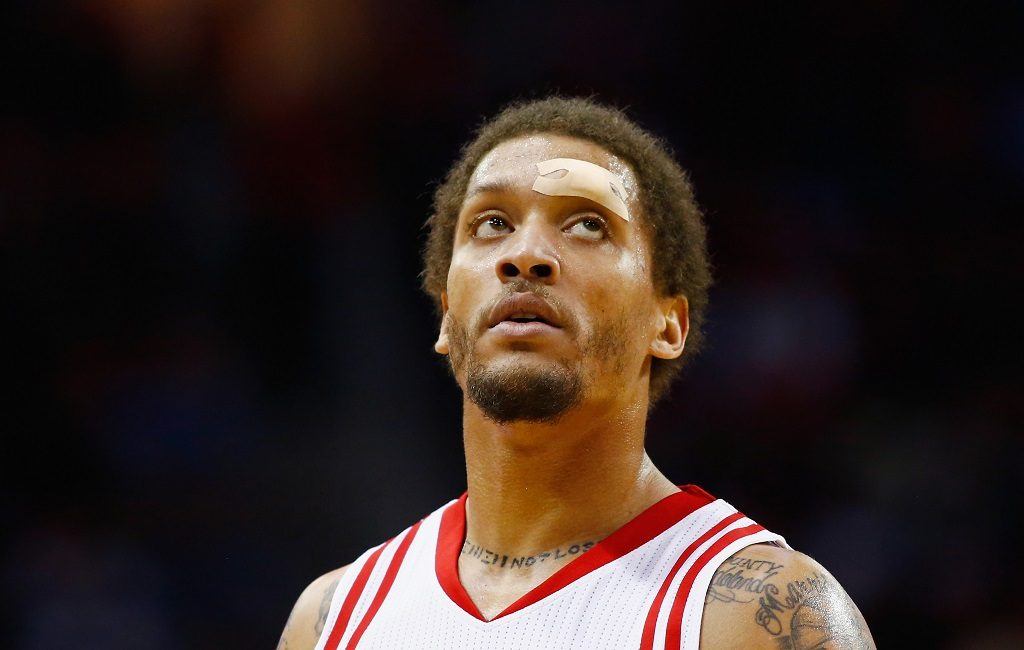 Michael Beasley looks up at the basketb before shooting a free throw.
