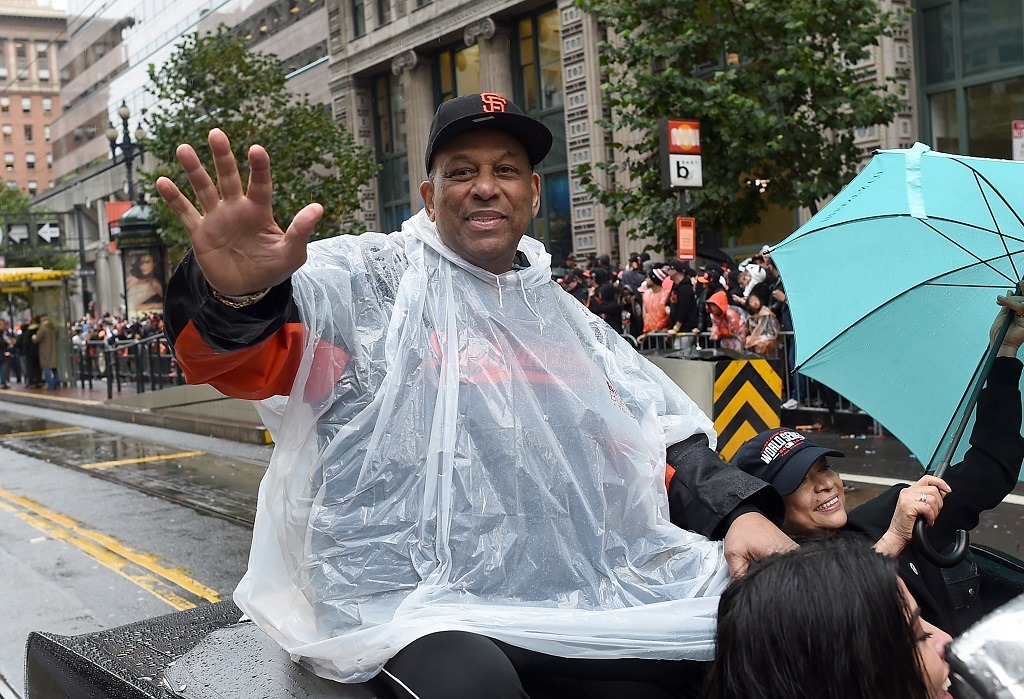 Orlando Cepeda, former San Francisco Giants great, waves to the crowd at the World Series Parade.