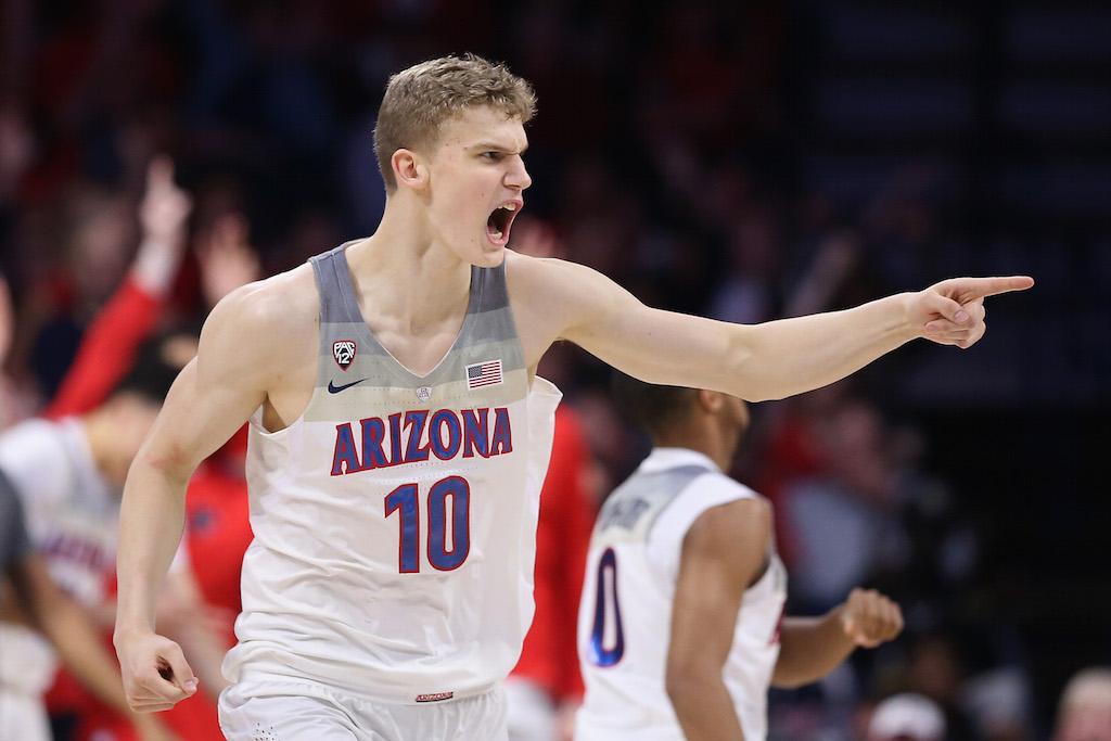 Lauri Markkanen #10 of the Arizona Wildcats reacts after hitting a triple.