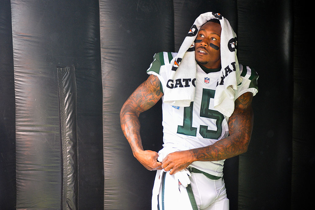 Brandon Marshall of the New York Jets looks on before a game.