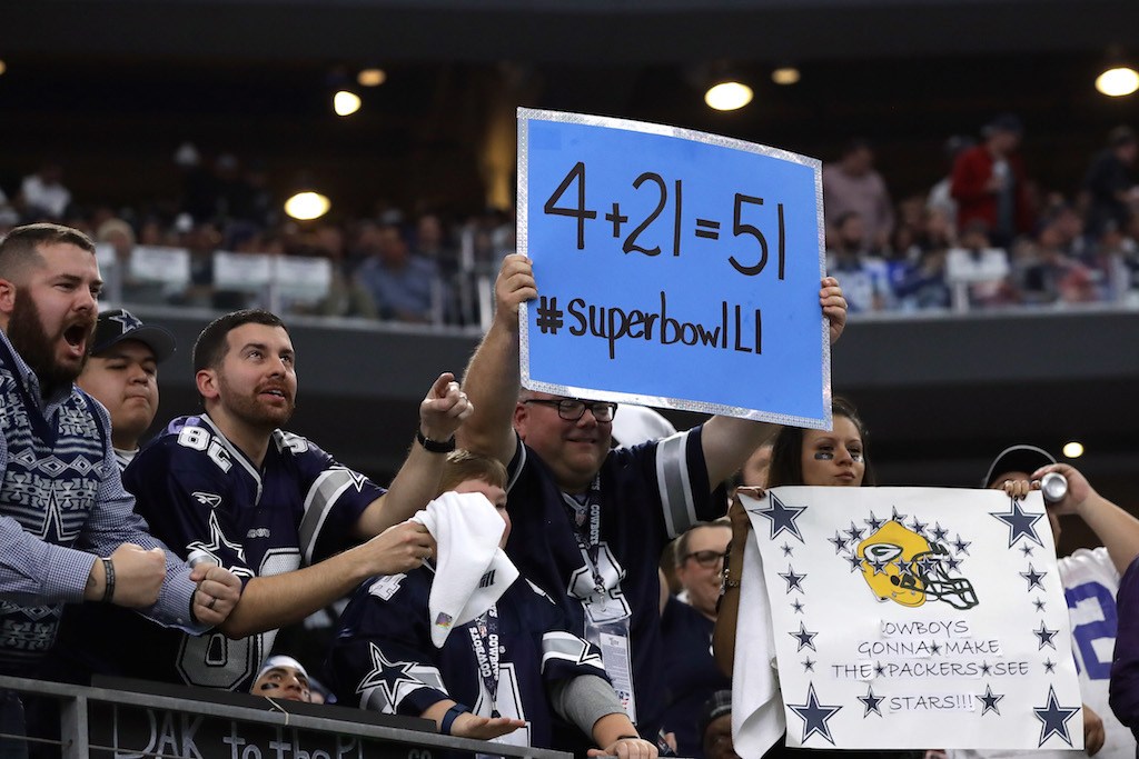 Dallas Cowboys fans cheer on their squad.