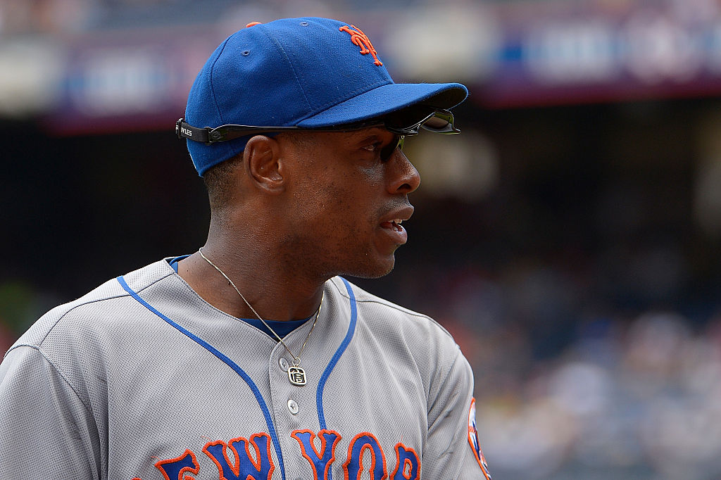 Curtis Granderson of the New York Mets walks back to the dugout.