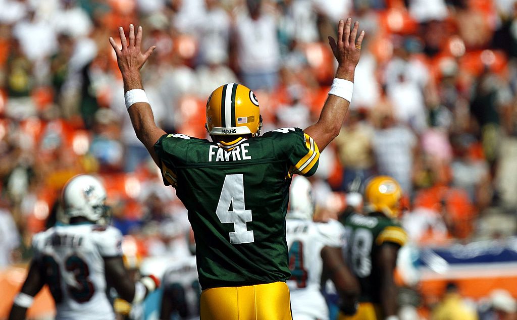 Quarterback Brett Favre of the Green Bay Packers celebrates a touchdown against the Miami Dolphins.