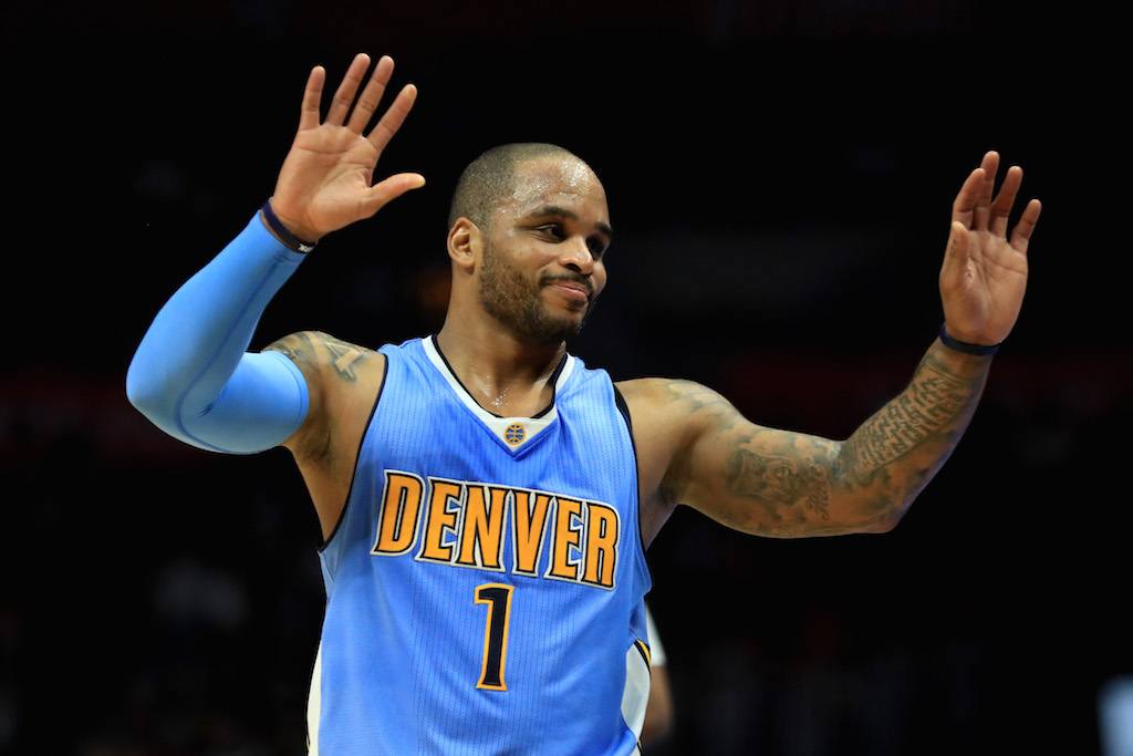 Jameer Nelson of the Denver Nuggets reacts to a foul.