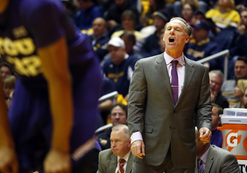 Jamie Dixon barks orders at his TCU players.