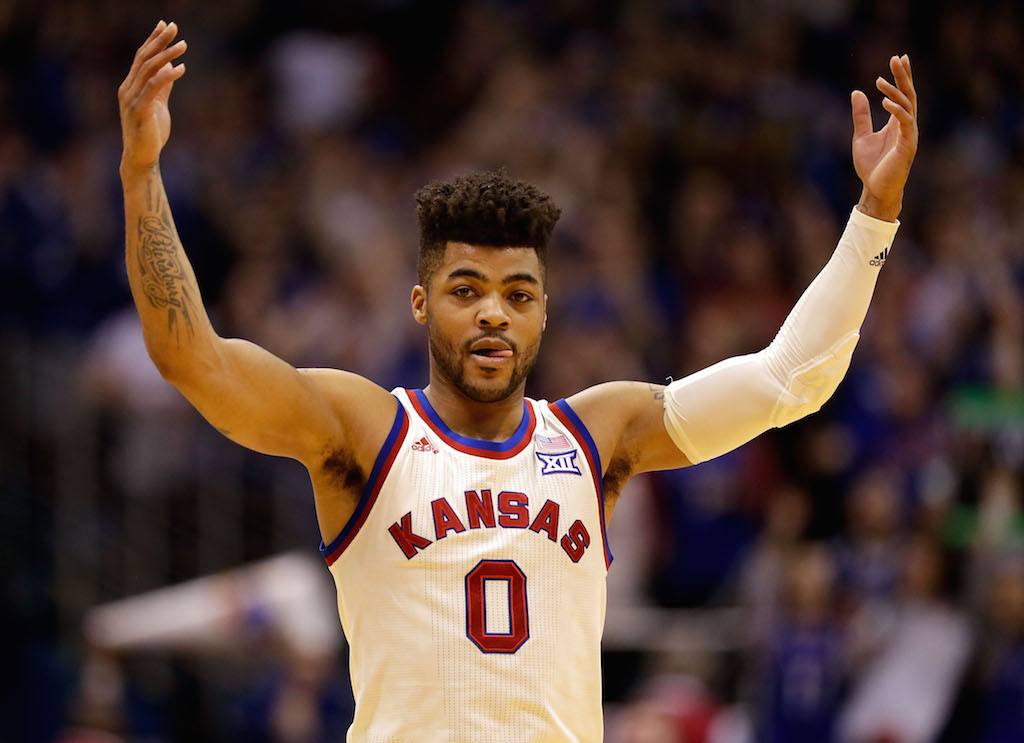 Frank Mason III #0 of the Kansas Jayhawks pumps up the crowd.